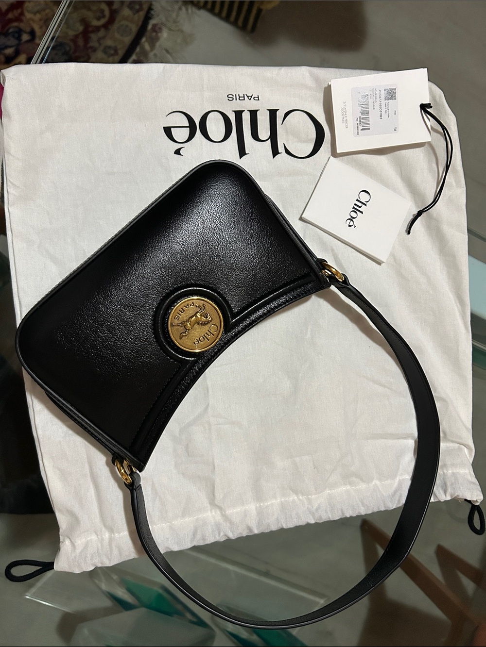 Chloé Black Leather Shoulder Bag with Gold Medallion